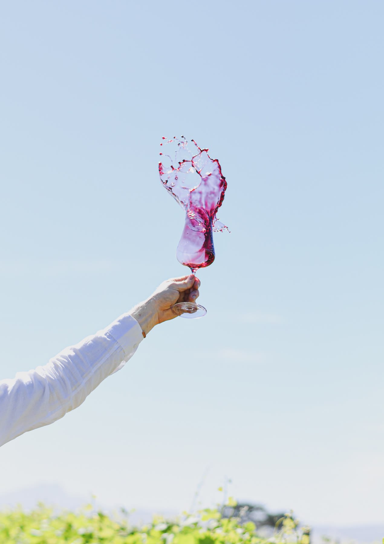 Wine splashing into a glass
